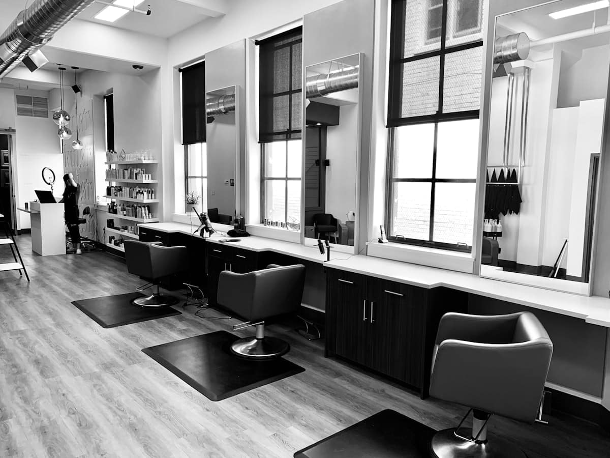 The room — chairs and mirrors in natural light