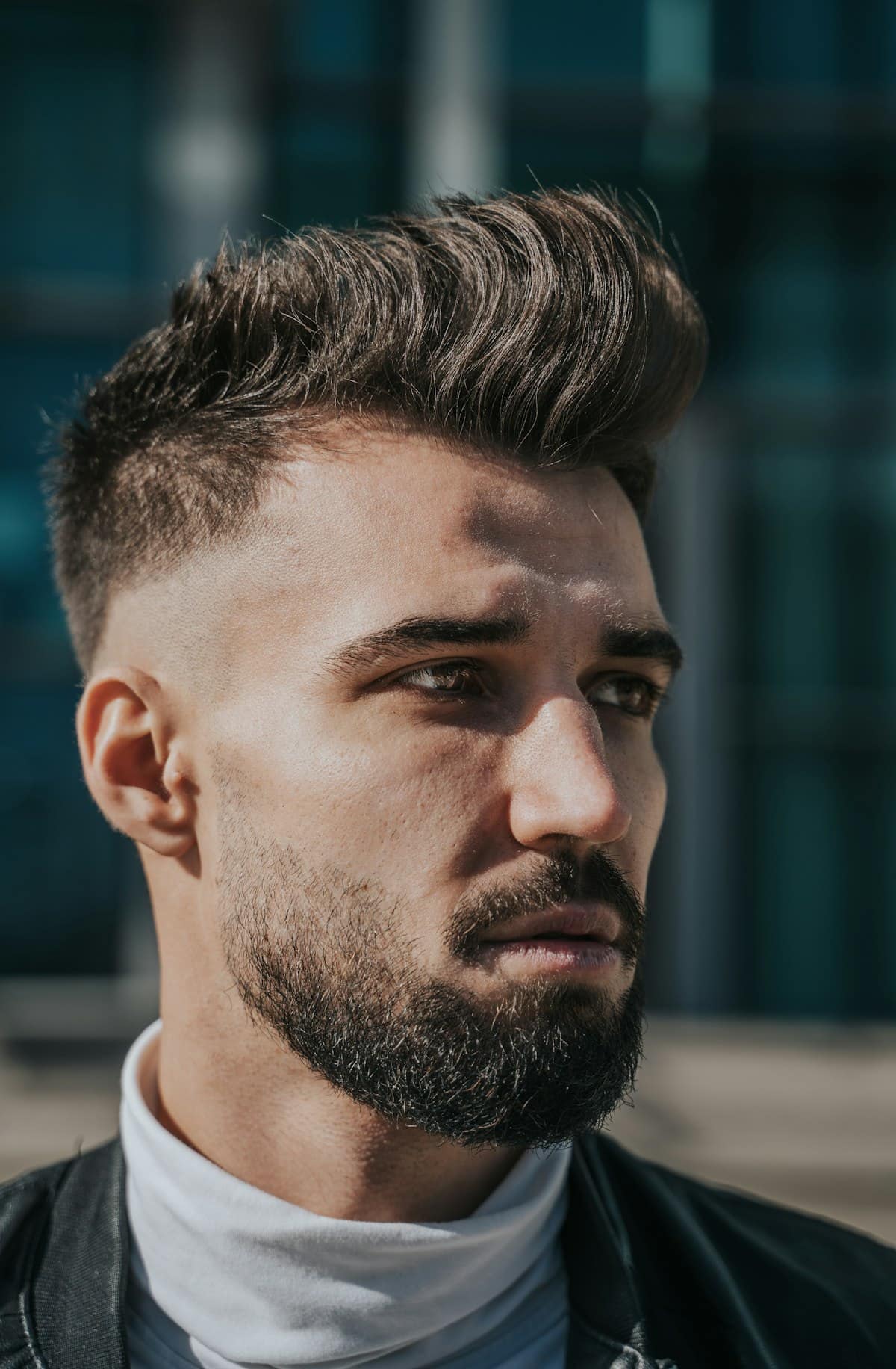 Modern quiff, tight at the sides