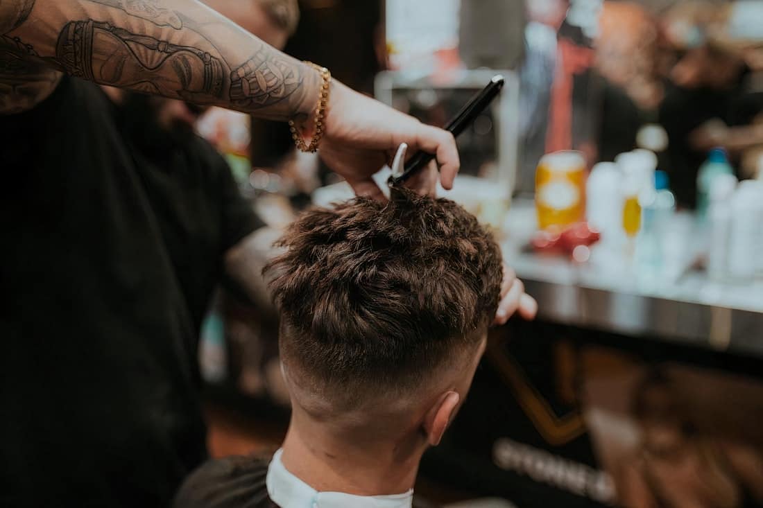 Maya at work — scissor-led shaping on longer hair
